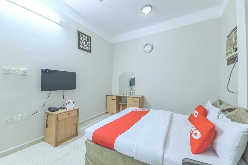 TV a/nebo společenská místnost v ubytování Super OYO 108 Marsa Al Masafar Hotel Apartment