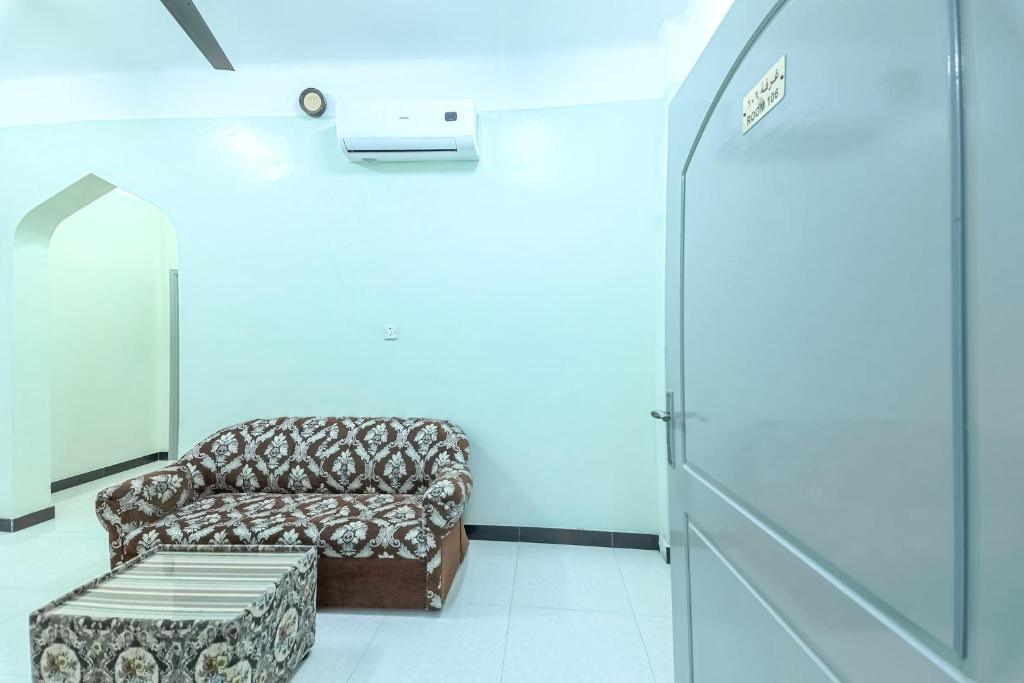 Posezení v ubytování Super OYO 108 Marsa Al Masafar Hotel Apartment