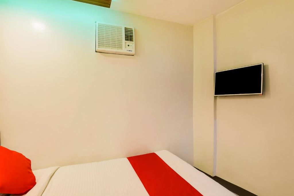 TV a/nebo společenská místnost v ubytování OYO 473 Ranchotel Drive-in