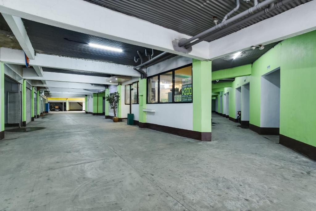 Fotografie z fotogalerie ubytování OYO 473 Ranchotel Drive-in v destinaci Biñan