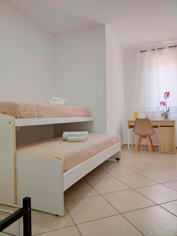 Postel nebo postele na pokoji v ubytování Serao House, 2 piano in centro