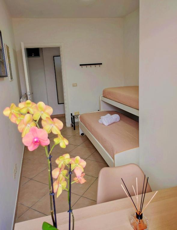 Postel nebo postele na pokoji v ubytování Serao House, 2 piano in centro