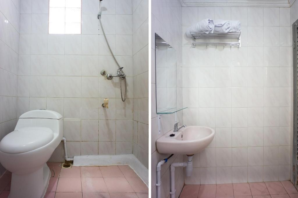 Koupelna v ubytování OYO 2180 Vina Vira Hotel