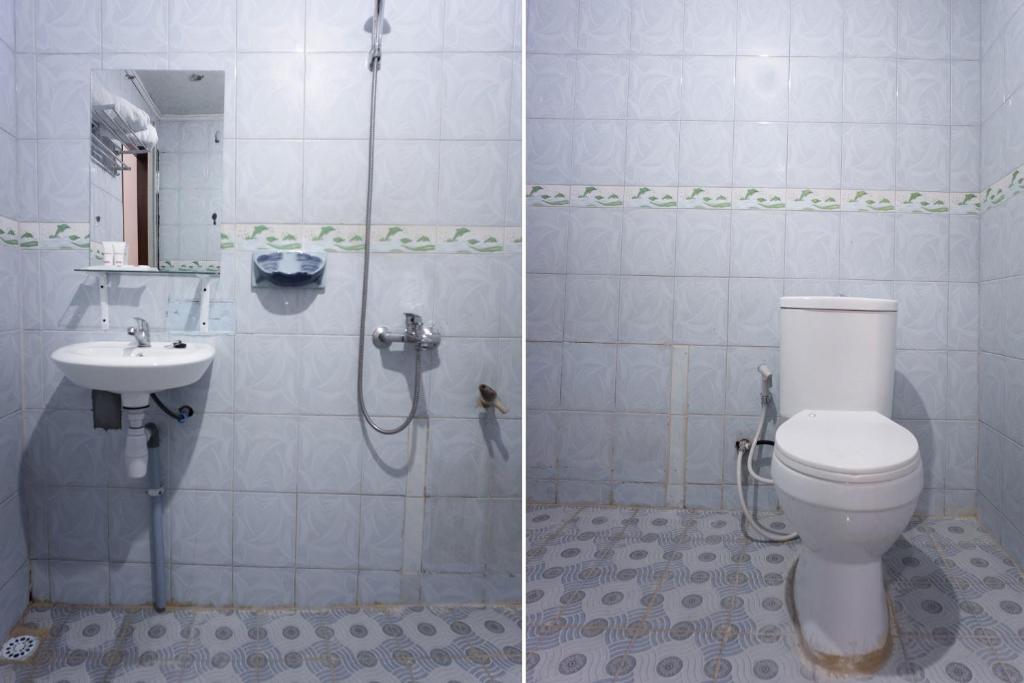 Koupelna v ubytování OYO 2180 Vina Vira Hotel