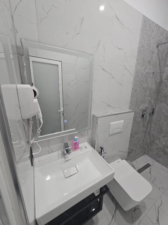 Koupelna v ubytování Elite Inn