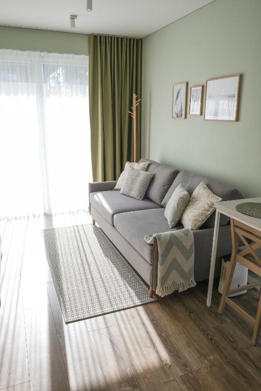 Posezení v ubytování Neringarent STUDIO-APARTAMENTAI