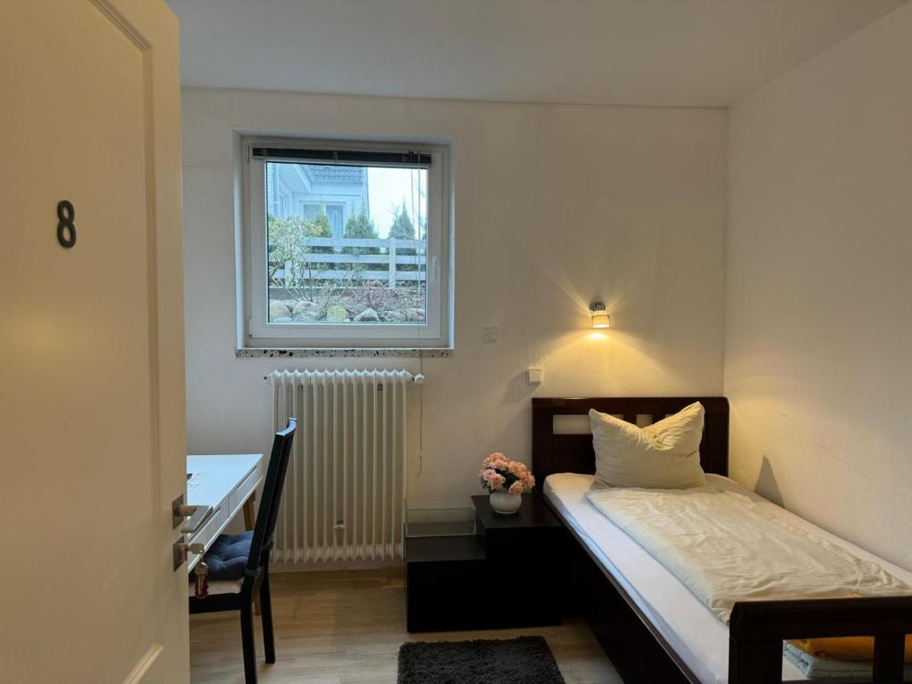 Postel nebo postele na pokoji v ubytování Haus Ostseestrand36