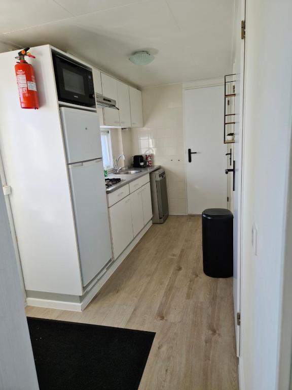 Kuchyň nebo kuchyňský kout v ubytování Chalet T18