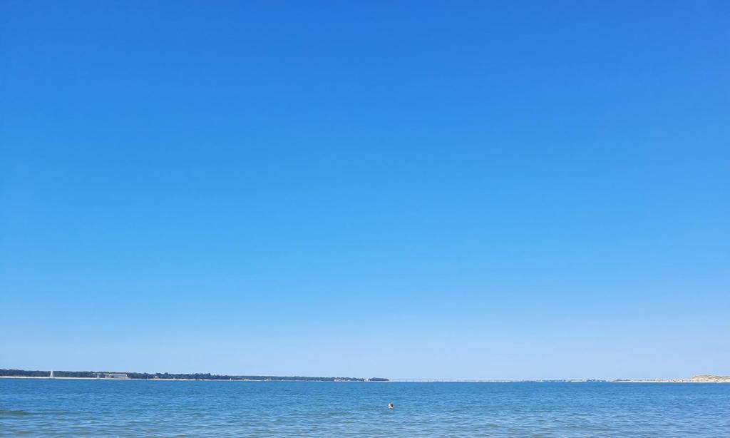 a view of the ocean from the beach at Mobil Home Charente-Maritime camping LA PIGNADE in La Tremblade