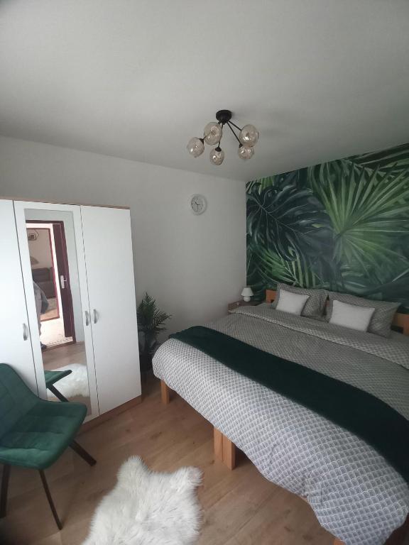 Ένα ή περισσότερα κρεβάτια σε δωμάτιο στο Apartman 2023