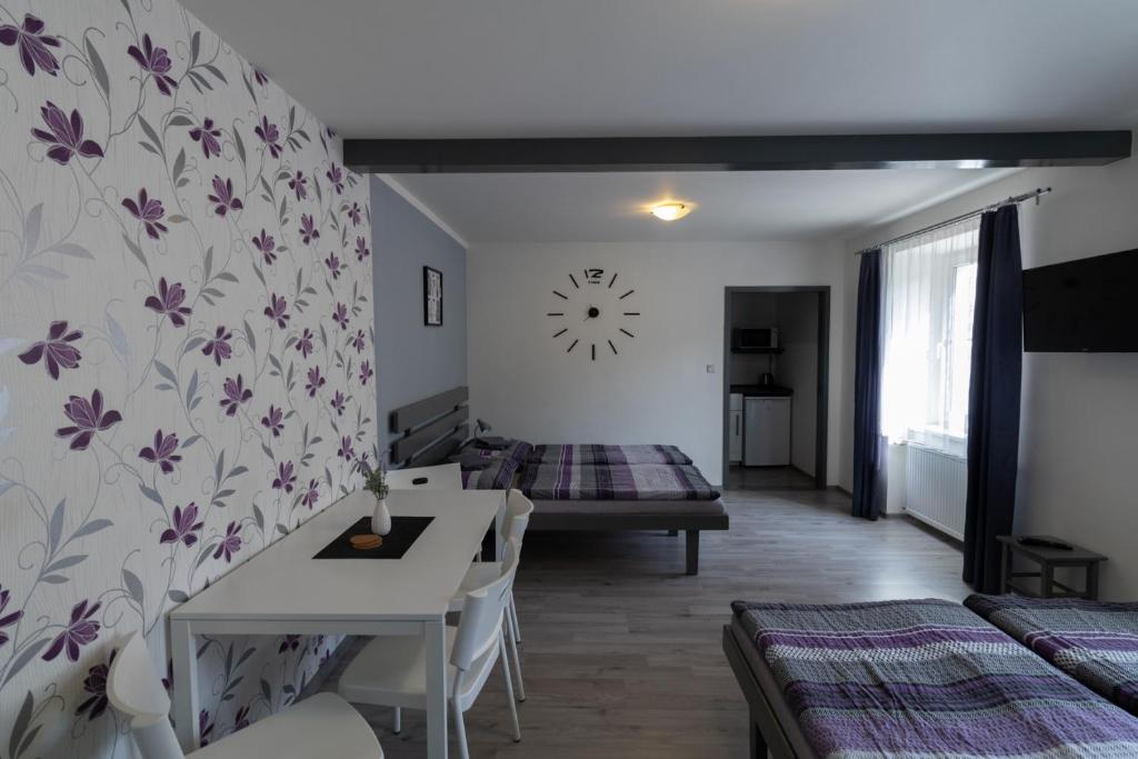 Postel nebo postele na pokoji v ubytování Apartmány Kamejk