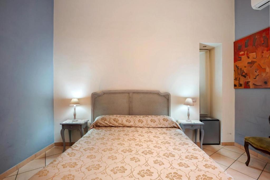 Łóżko lub łóżka w pokoju w obiekcie B&B Verdi