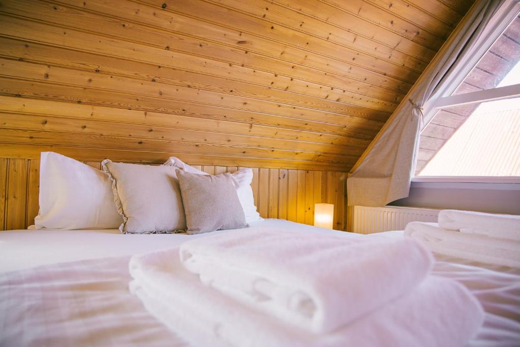 Postel nebo postele na pokoji v ubytování Milli Vina Guesthouse