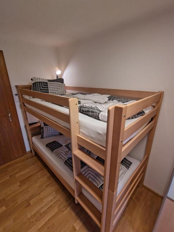 Postel nebo postele na pokoji v ubytování Apartment Weitblick