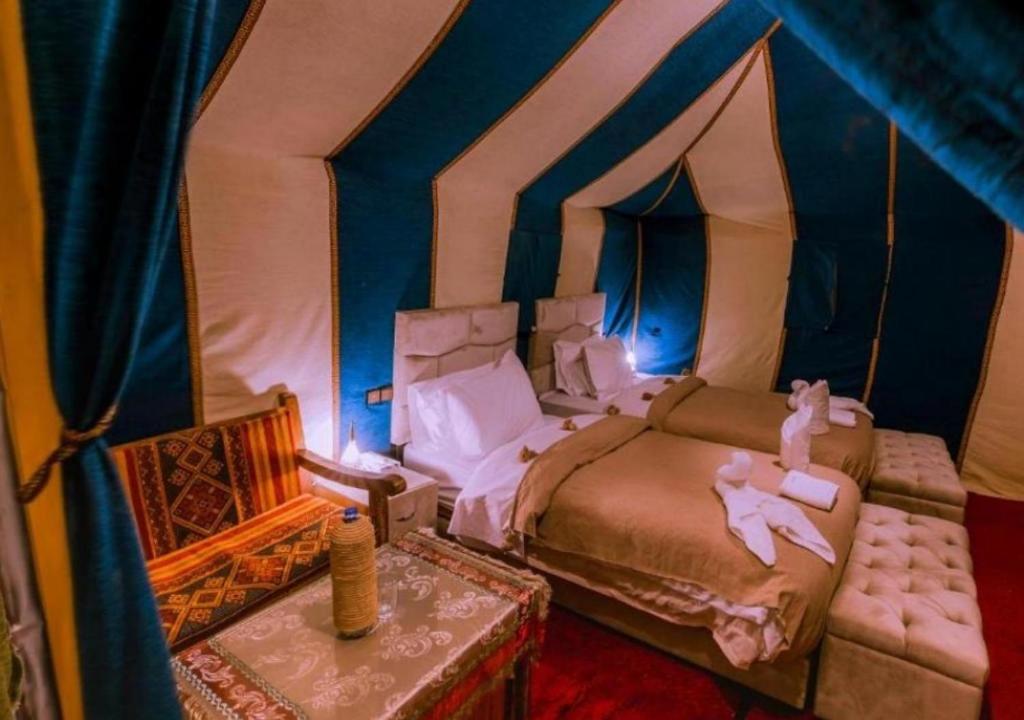 Postel nebo postele na pokoji v ubytování Luxury Spirit Camp