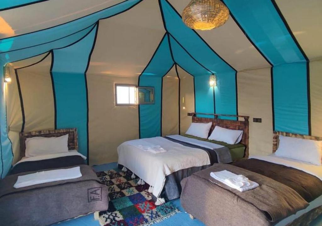 Postel nebo postele na pokoji v ubytování Luxury Spirit Camp