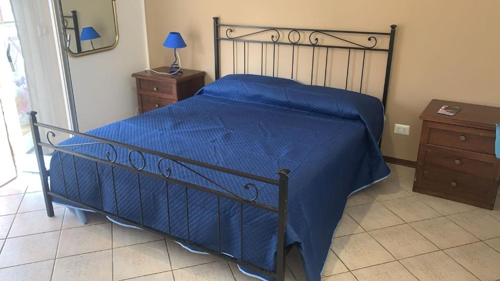 Postel nebo postele na pokoji v ubytování Home Rosal Schisò Beach