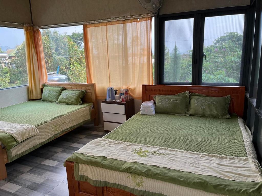 Postel nebo postele na pokoji v ubytování Mỹ Tiên Homestay