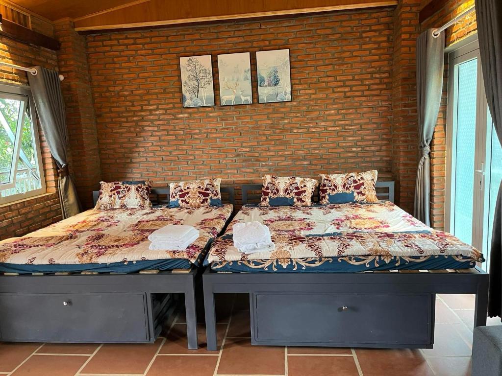 Postel nebo postele na pokoji v ubytování Mỹ Tiên Homestay