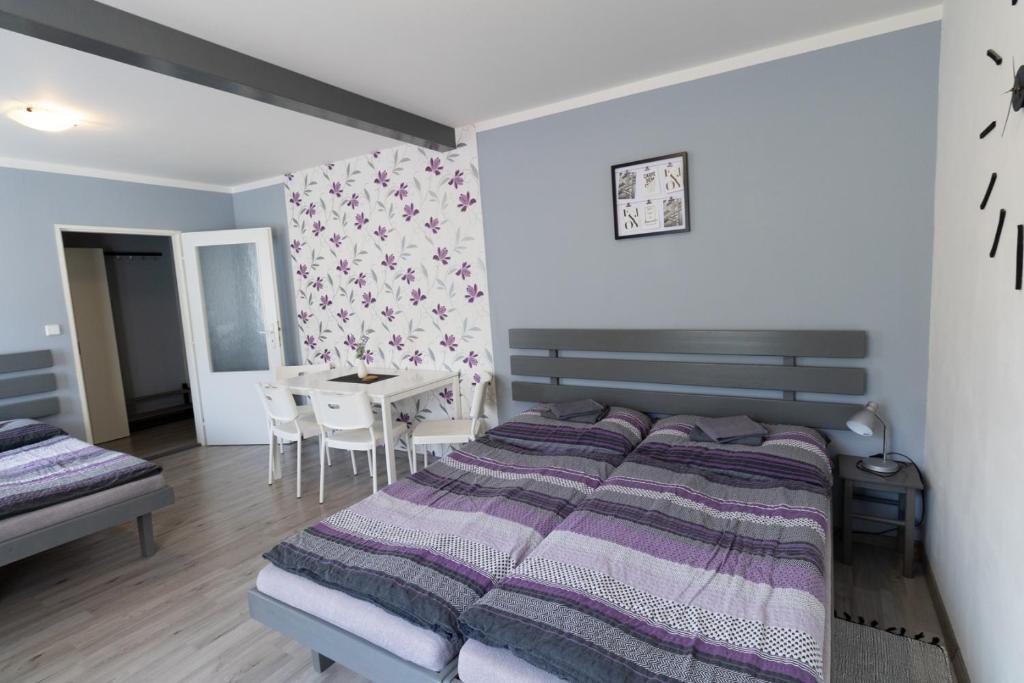 Postel nebo postele na pokoji v ubytování Penzion Kamejk