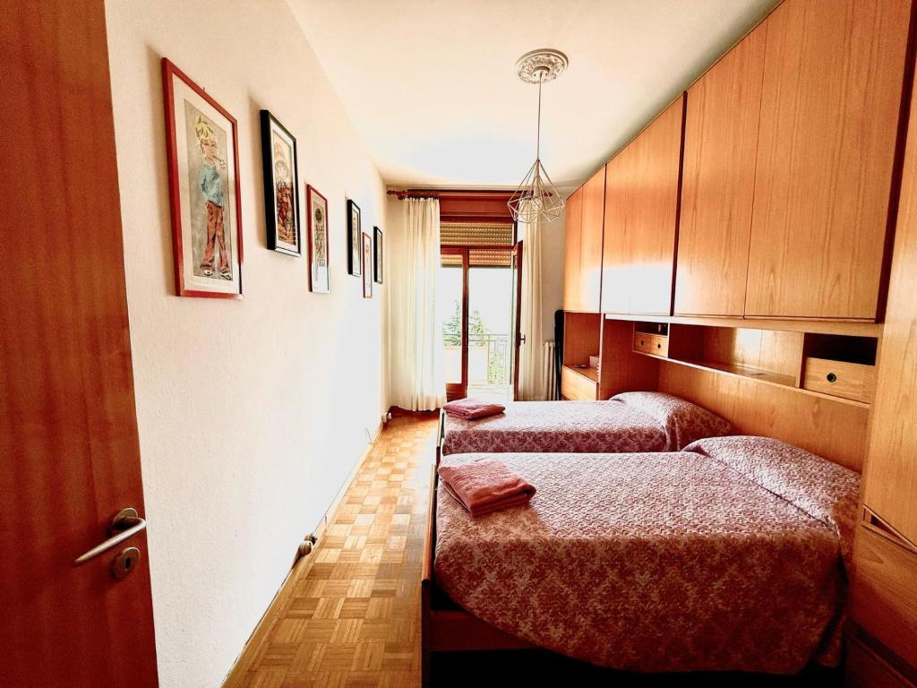 Llit o llits en una habitació de casa vacanza Tivàn