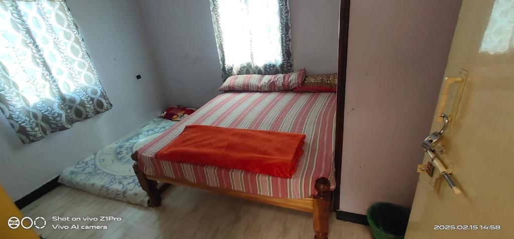 Voodi või voodid majutusasutuse Shree chendur Residency AC ROOMS toas