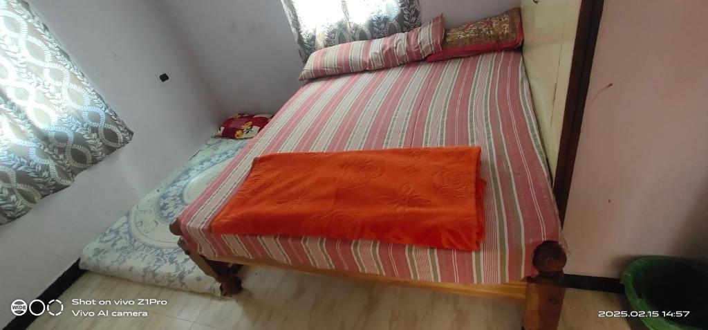 Voodi või voodid majutusasutuse Shree chendur Residency AC ROOMS toas