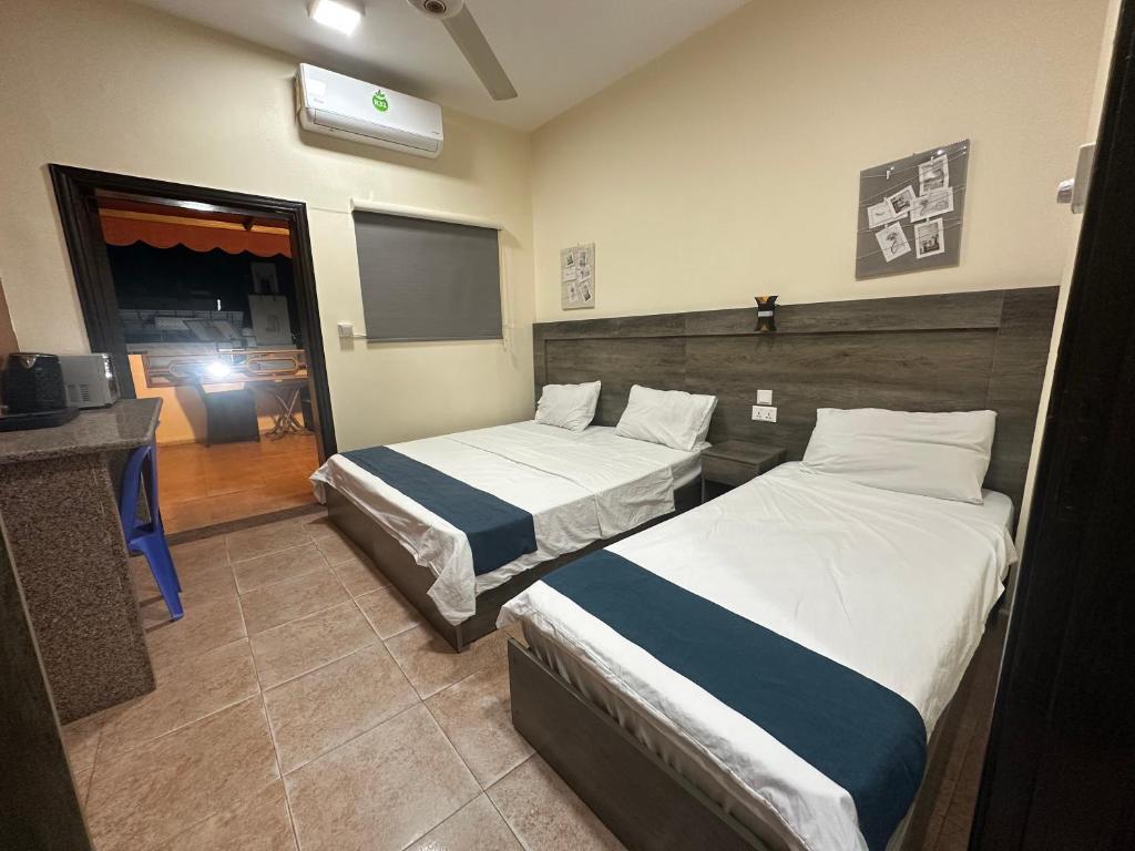 Postel nebo postele na pokoji v ubytování Relax House For Studio Rooms Apartment