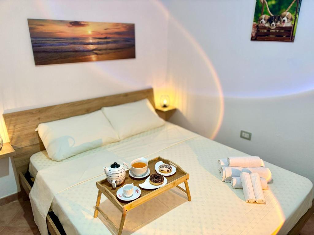 Postel nebo postele na pokoji v ubytování NewDesign - Apartment in the Heart of Sassari
