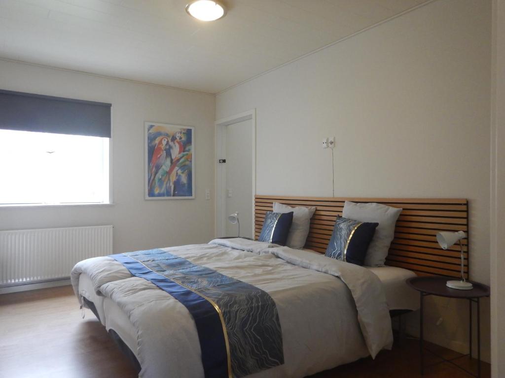 Postel nebo postele na pokoji v ubytování Stay in Brøns