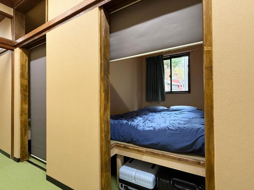 Postel nebo postele na pokoji v ubytování Budget Room JINYA
