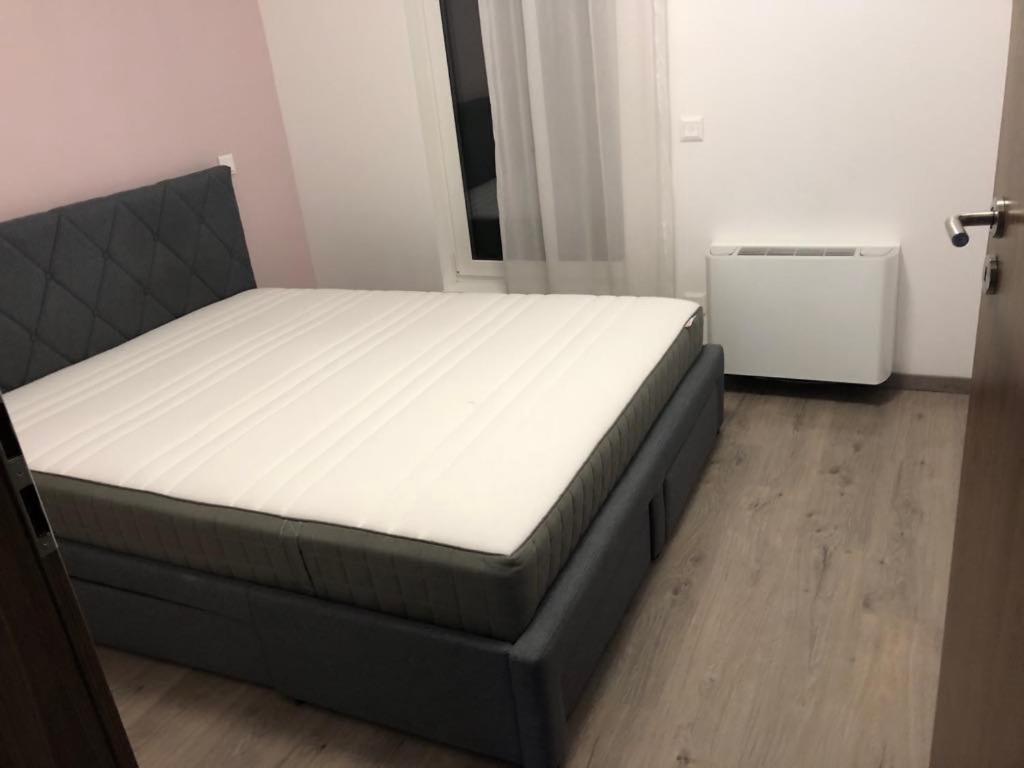 Posteľ alebo postele v izbe v ubytovaní Ádám Guesthouse I.