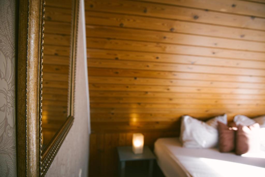 Postel nebo postele na pokoji v ubytování Milli Vina Guesthouse