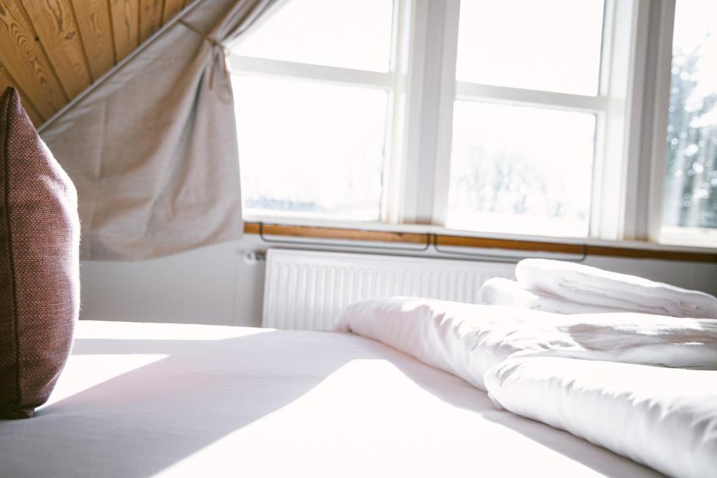 Postel nebo postele na pokoji v ubytování Milli Vina Guesthouse