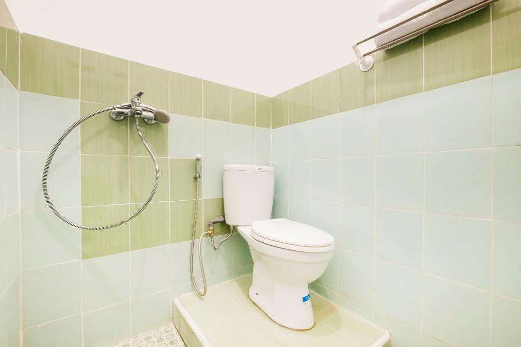 Koupelna v ubytování OYO 2394 Hotel Brosta