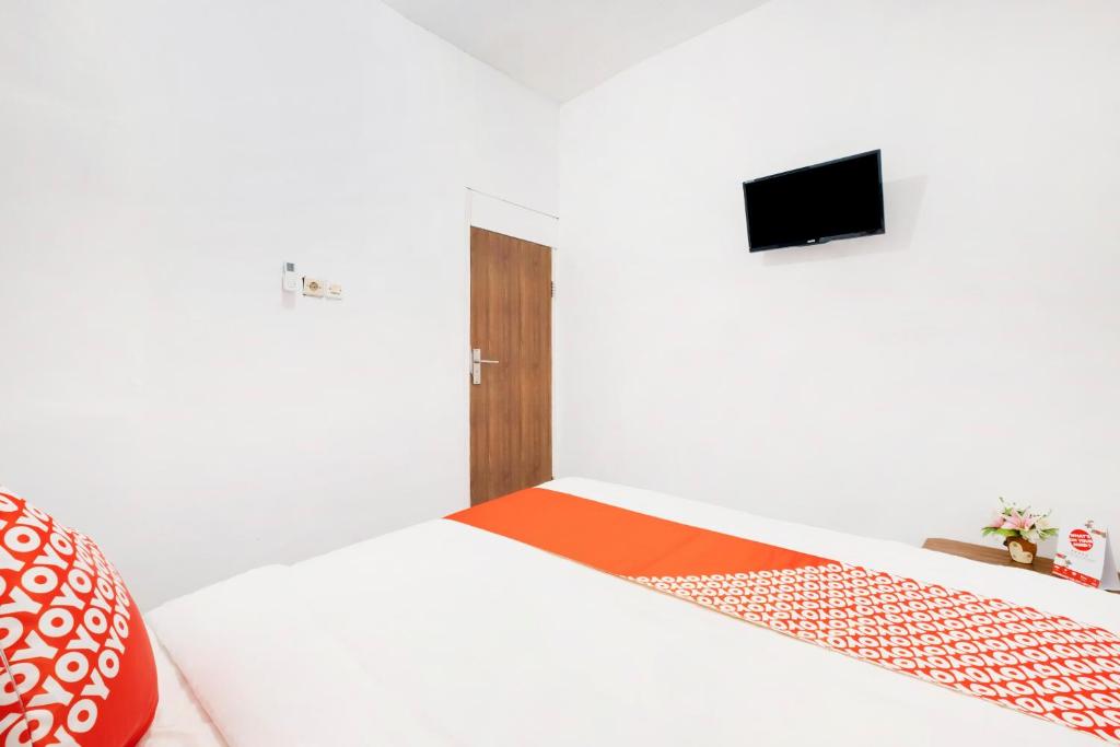 TV a/nebo společenská místnost v ubytování OYO 2394 Hotel Brosta