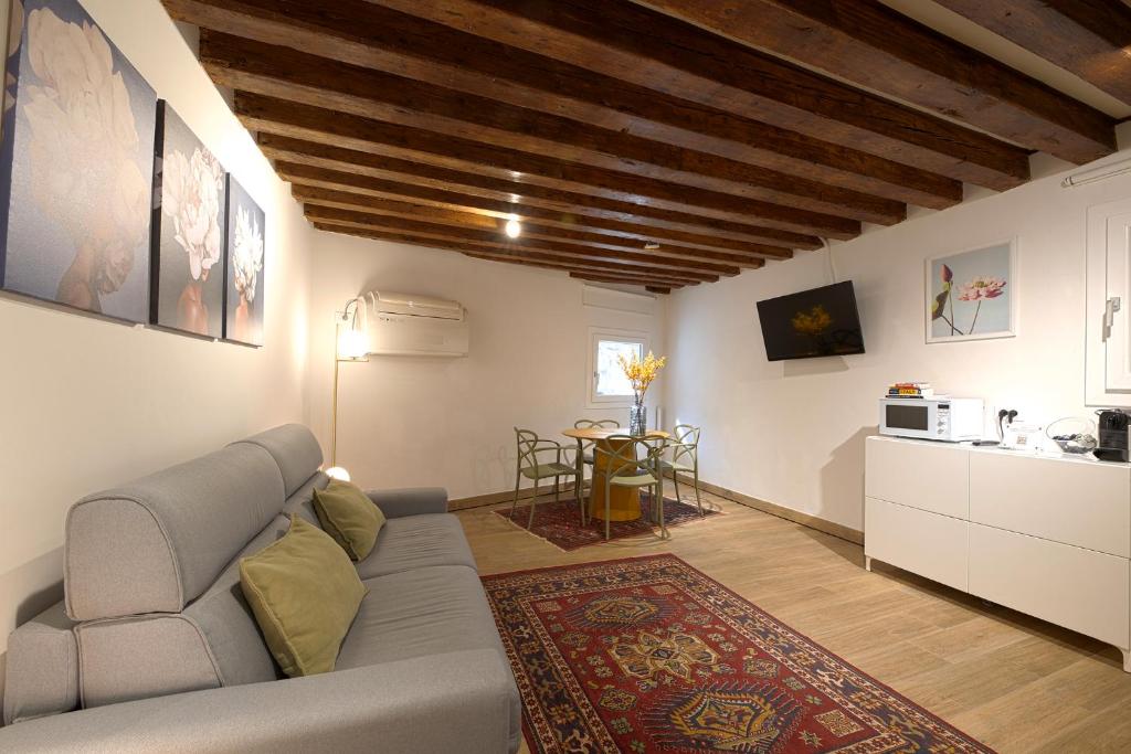 TV o dispositivi per l'intrattenimento presso Mascherone Apartment