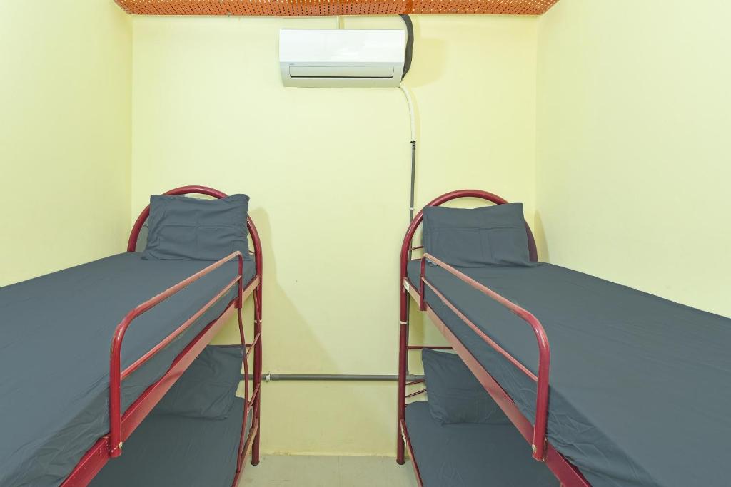 Postel nebo postele na pokoji v ubytování SPOT ON 89753 Sohotel