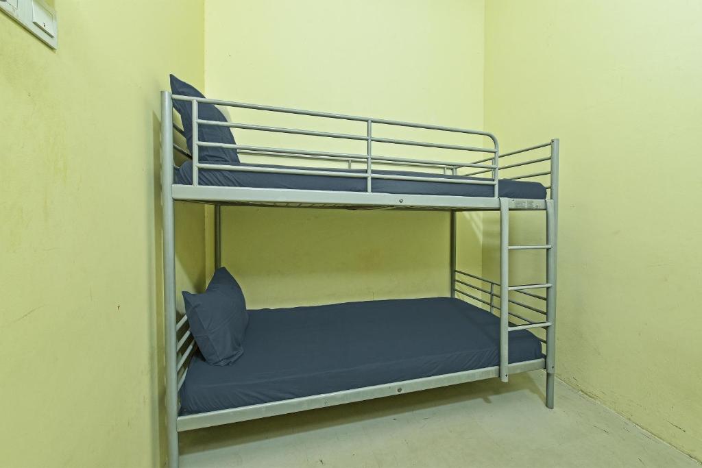 Postel nebo postele na pokoji v ubytování SPOT ON 89753 Sohotel