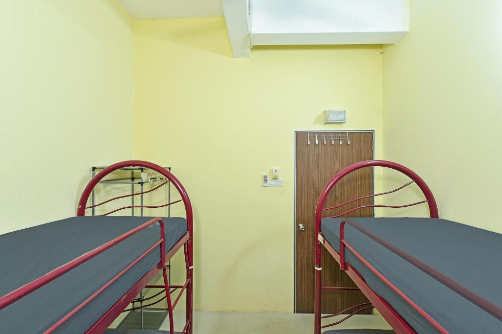Postel nebo postele na pokoji v ubytování SPOT ON 89753 Sohotel