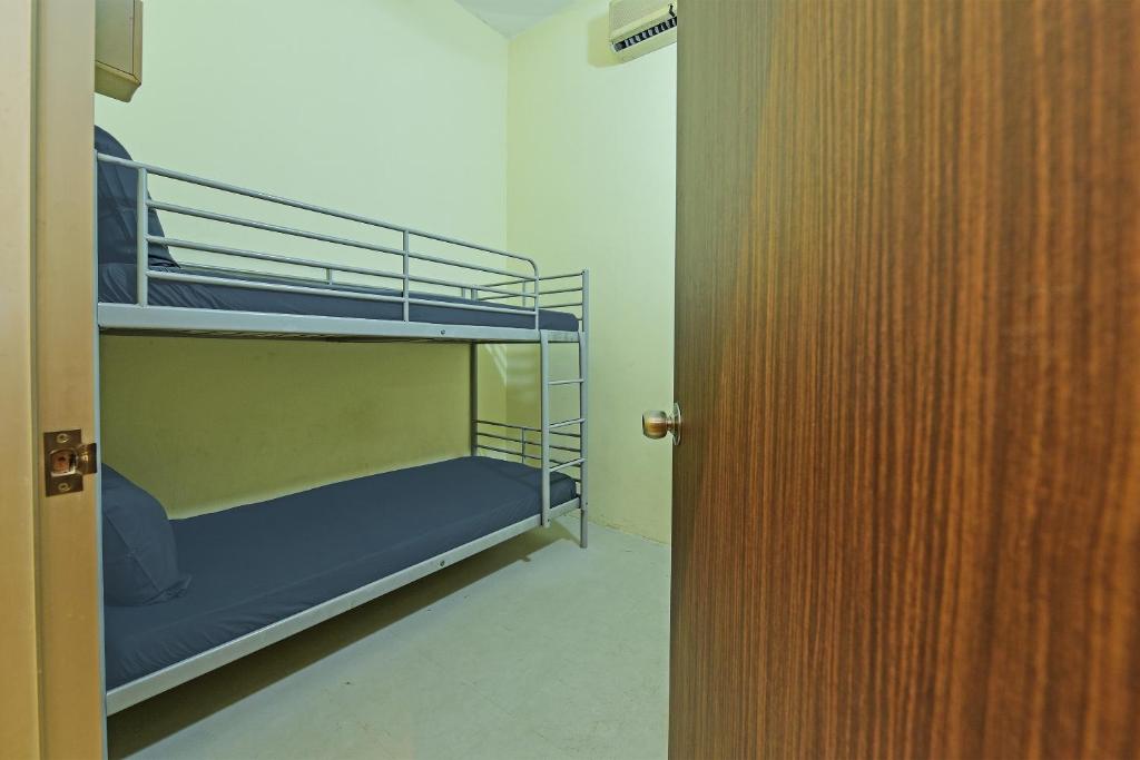 Postel nebo postele na pokoji v ubytování SPOT ON 89753 Sohotel