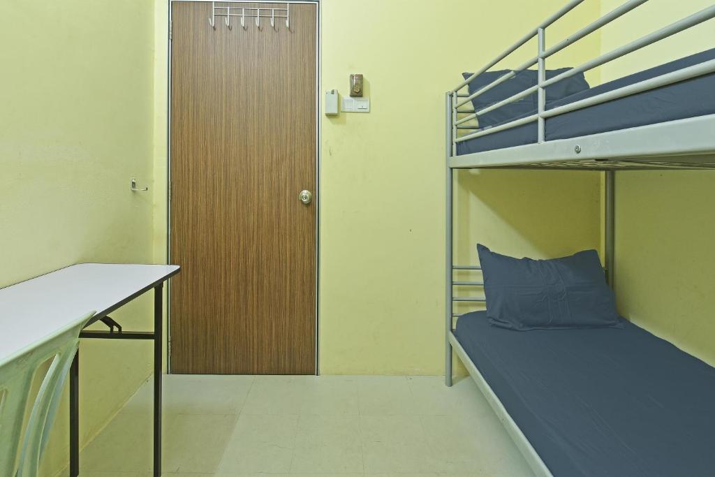 Postel nebo postele na pokoji v ubytování SPOT ON 89753 Sohotel