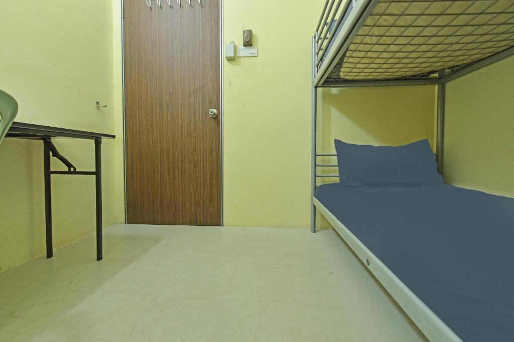 Postel nebo postele na pokoji v ubytování SPOT ON 89753 Sohotel