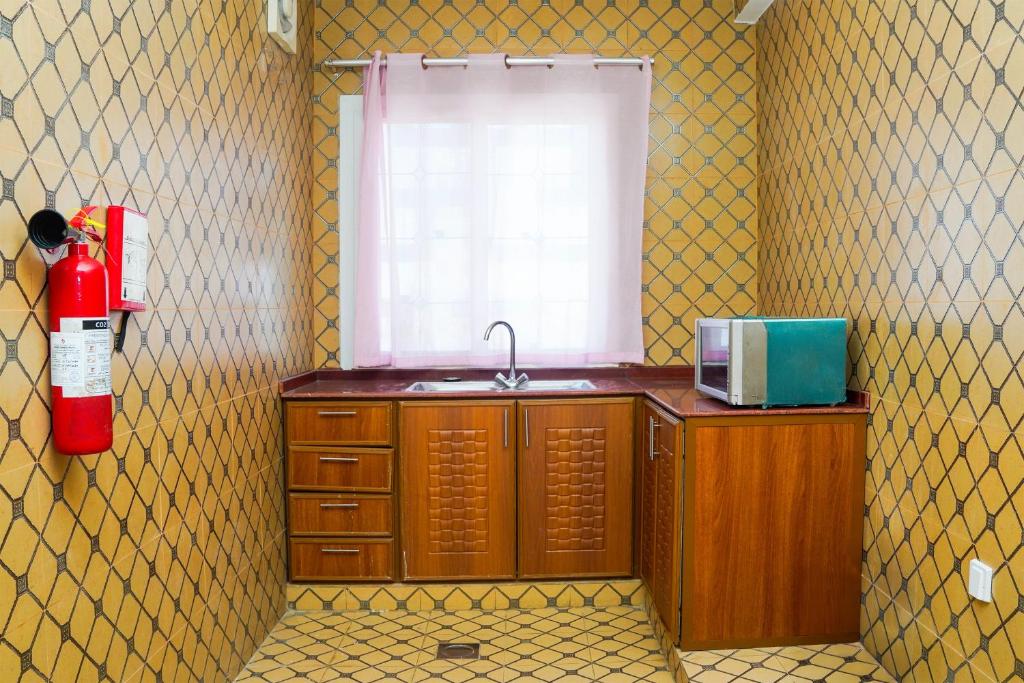 Kuchyň nebo kuchyňský kout v ubytování Palette Muscat Al Bayrahaa