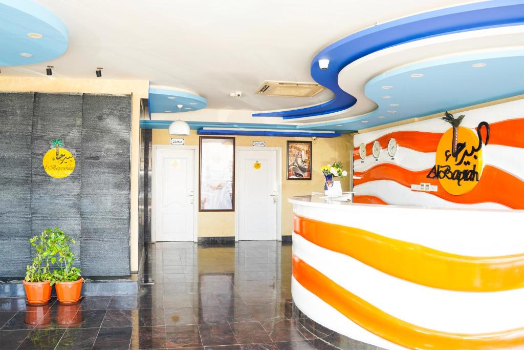 Postel nebo postele na pokoji v ubytování Palette Muscat Al Bayrahaa