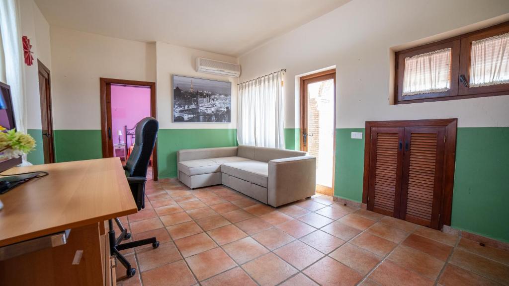 A bed or beds in a room at VILLA CANTARES