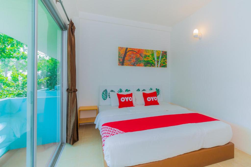 Postel nebo postele na pokoji v ubytování Koh Lak Resort