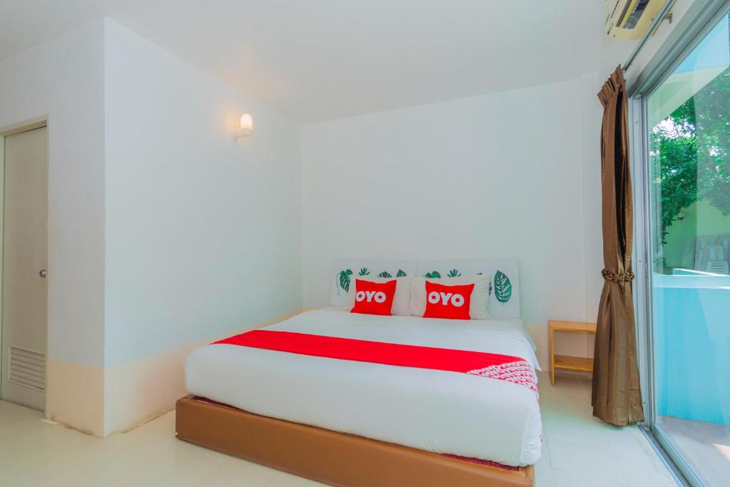 Postel nebo postele na pokoji v ubytování Koh Lak Resort