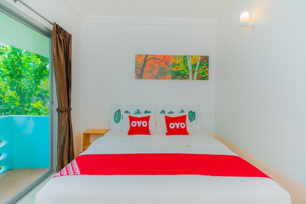 Postel nebo postele na pokoji v ubytování Koh Lak Resort