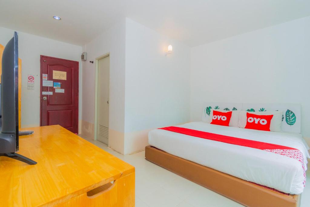 Postel nebo postele na pokoji v ubytování Koh Lak Resort
